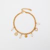 Pulseira de pé charm